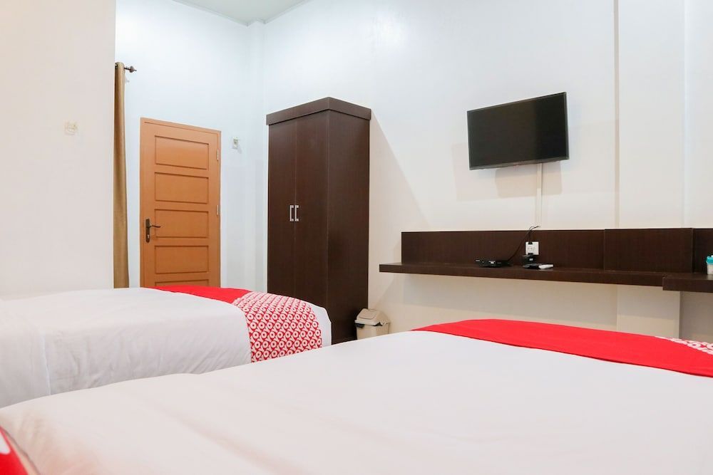 Паданг: Oyo 1994 Baba Guest House