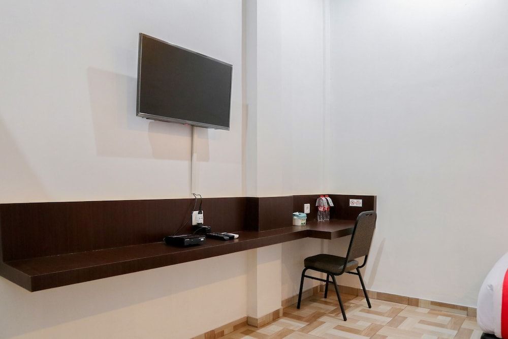 Паданг: Oyo 1994 Baba Guest House