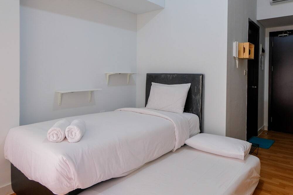 Legok: Homey Studio Room At Casa De Parco Apartment By Travelio
