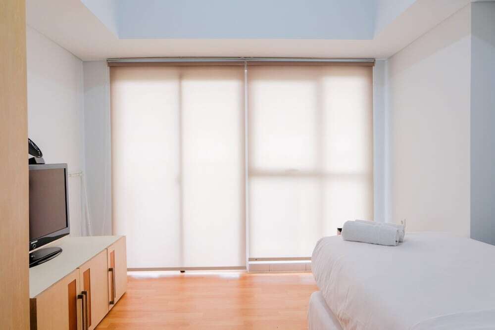Legok: Homey Studio Room At Casa De Parco Apartment By Travelio
