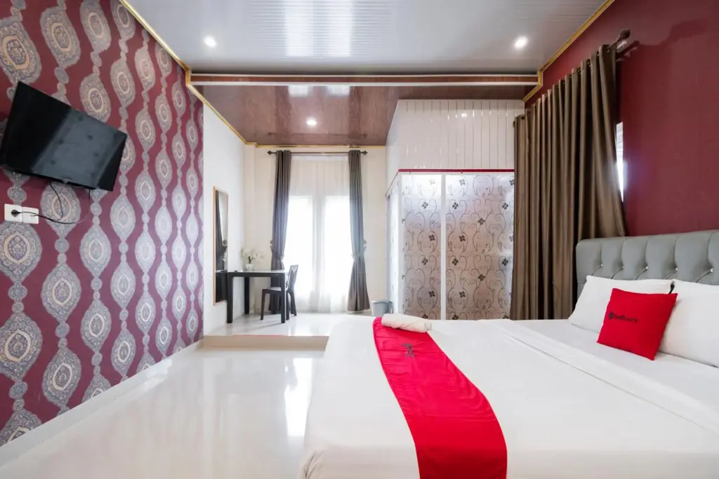 Паданг: OYO 1648 Penginapan Three Joye