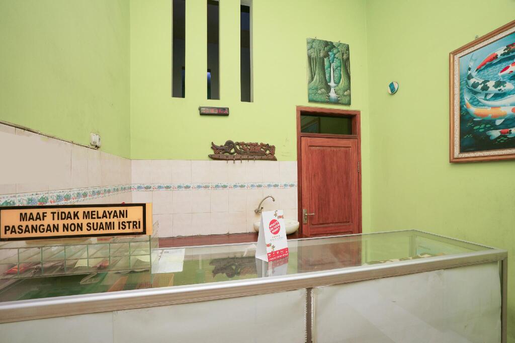 Проболинго: OYO 1639 Penginapan Anggrek Syariah 1