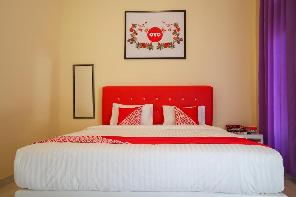 Паданг: OYO 2202 Delima Guest House Syariah