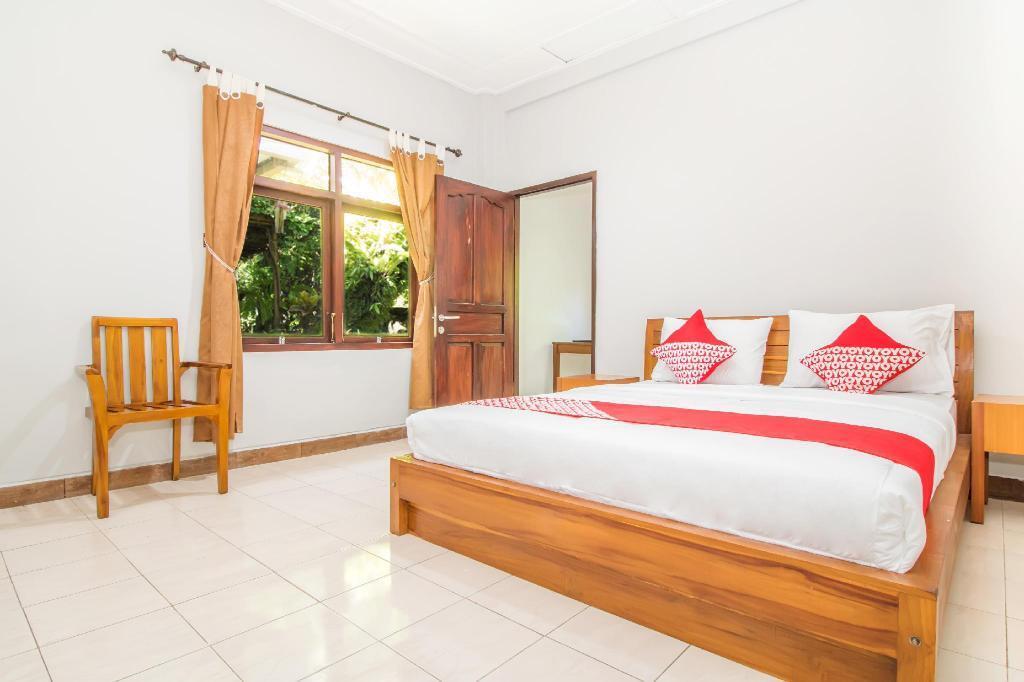 Денпасар: OYO 2404 Arca Guest House