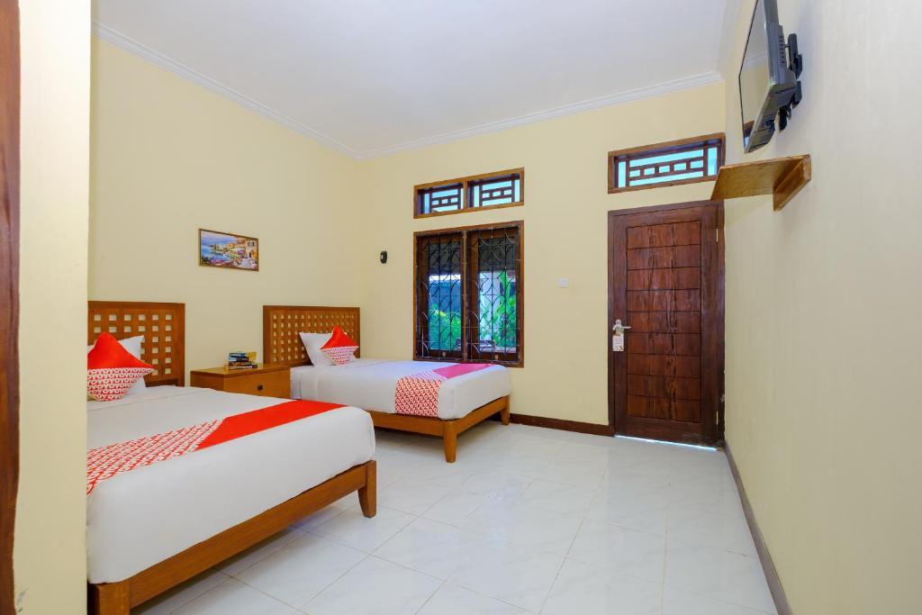 Мангсит: OYO 2864 Mangsit Garden Homestay