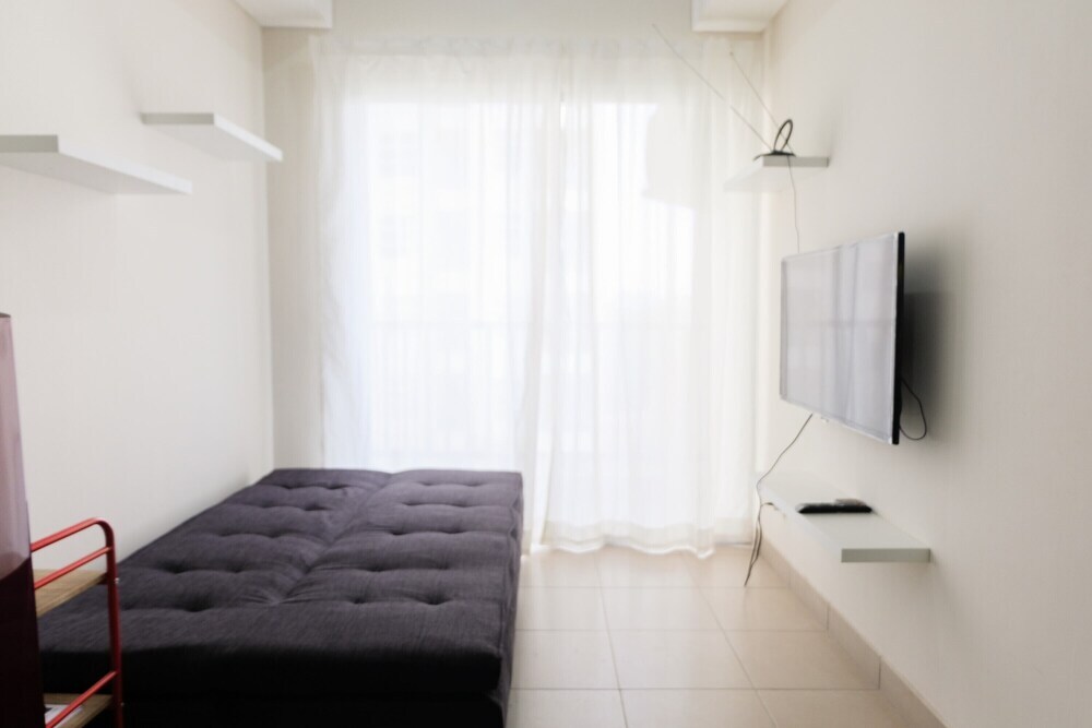 Legok: Elegant and Comfy 1BR Saveria Apartment near ICE BSD By Travelio