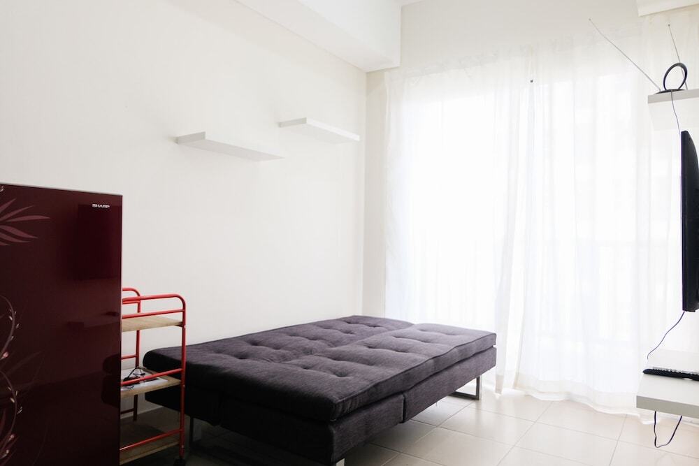 Elegant and Comfy 1BR Saveria Apartment near ICE BSD By Travelio — фото 1