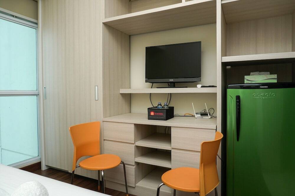 Джакарта: Furnished Studio with Pool View at Puri Orchard Apartment
