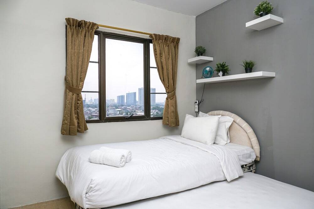 Джакарта: Spacious and Comfortable 2BR Puri Garden Apartment