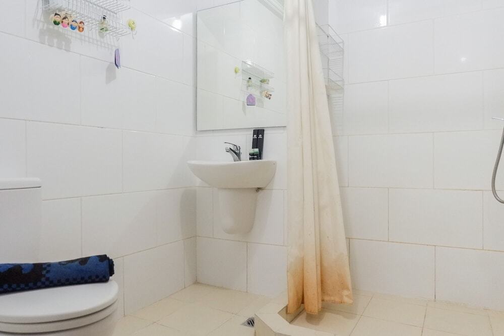 Сурабая: Cozy 2BR at Waterplace Apartment