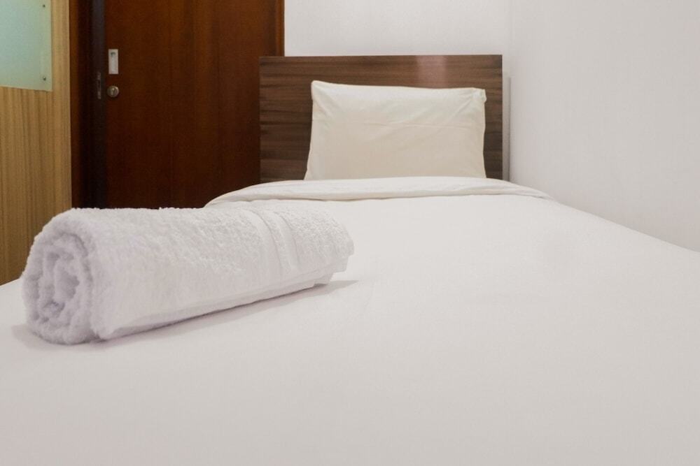 Сурабая: Homey and Comfy 2BR Apartment at Waterplace Residence