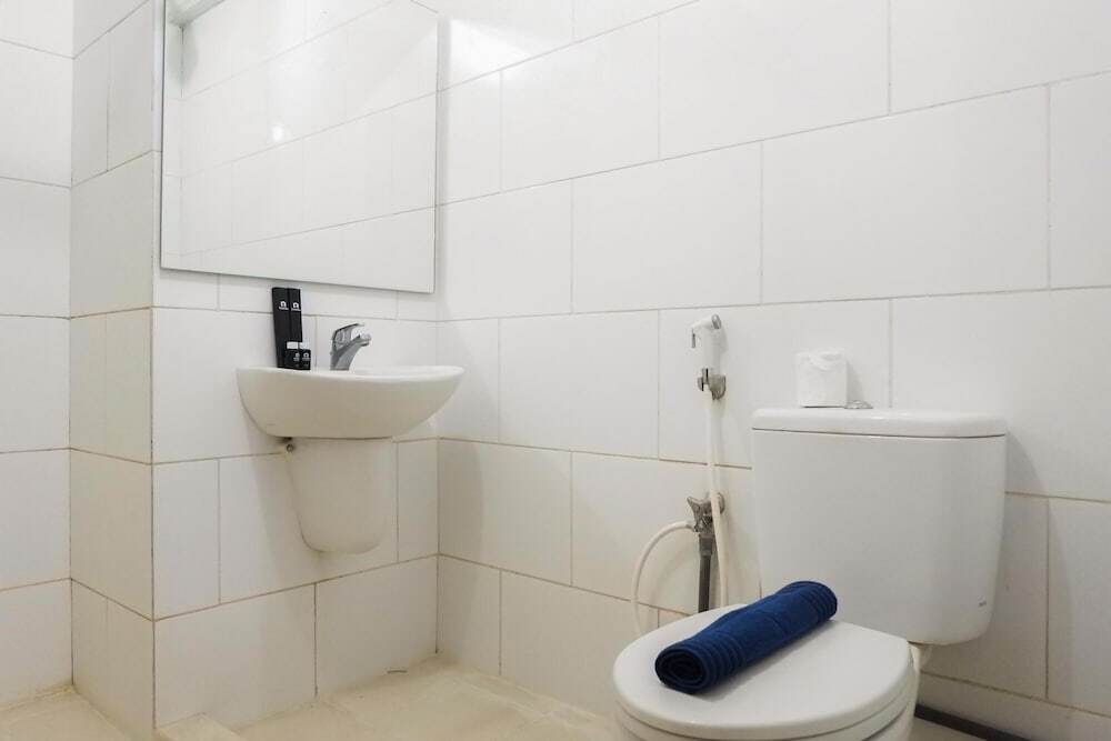 Сурабая: Homey and Comfy 2BR Apartment at Waterplace Residence