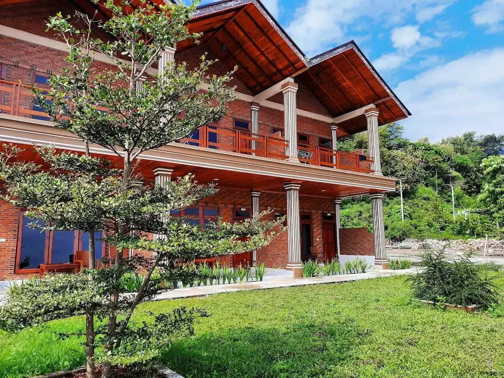 Озеро Тоба: Juma Cottages