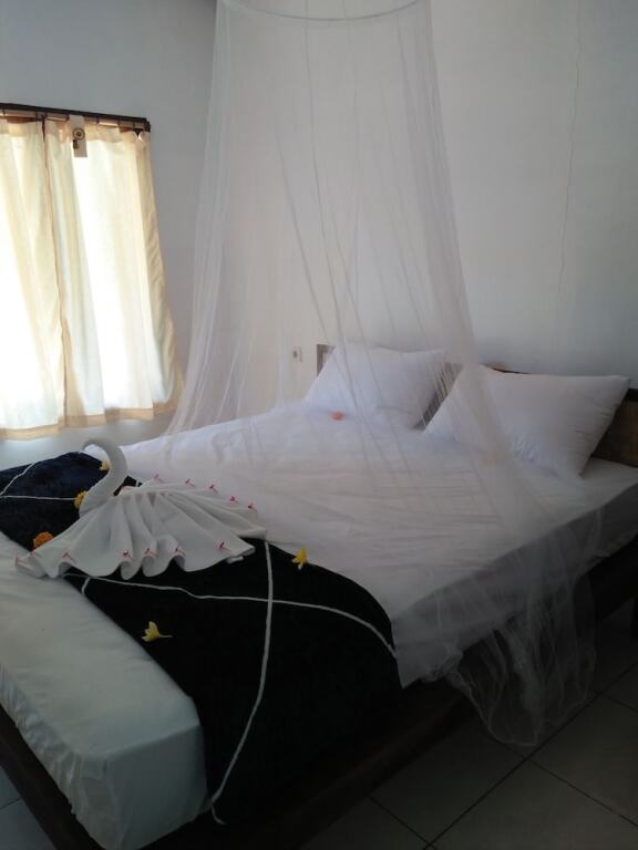 Педжаракан: Taman Menjangan Homestay