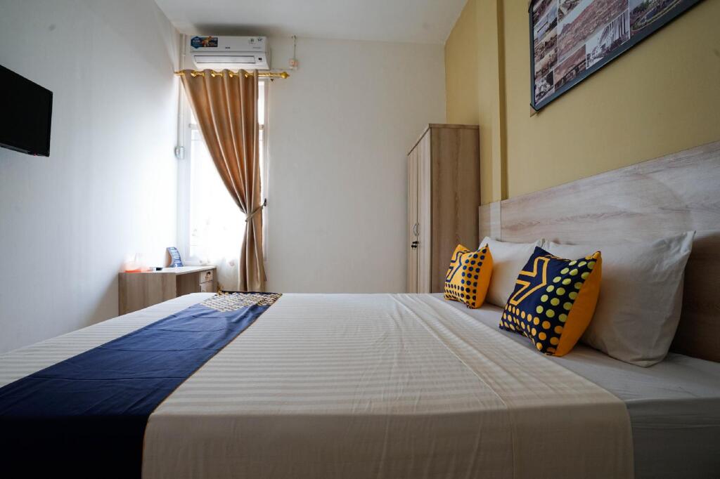 Тарутунг: Oyo 2220 Pink'S Guest House