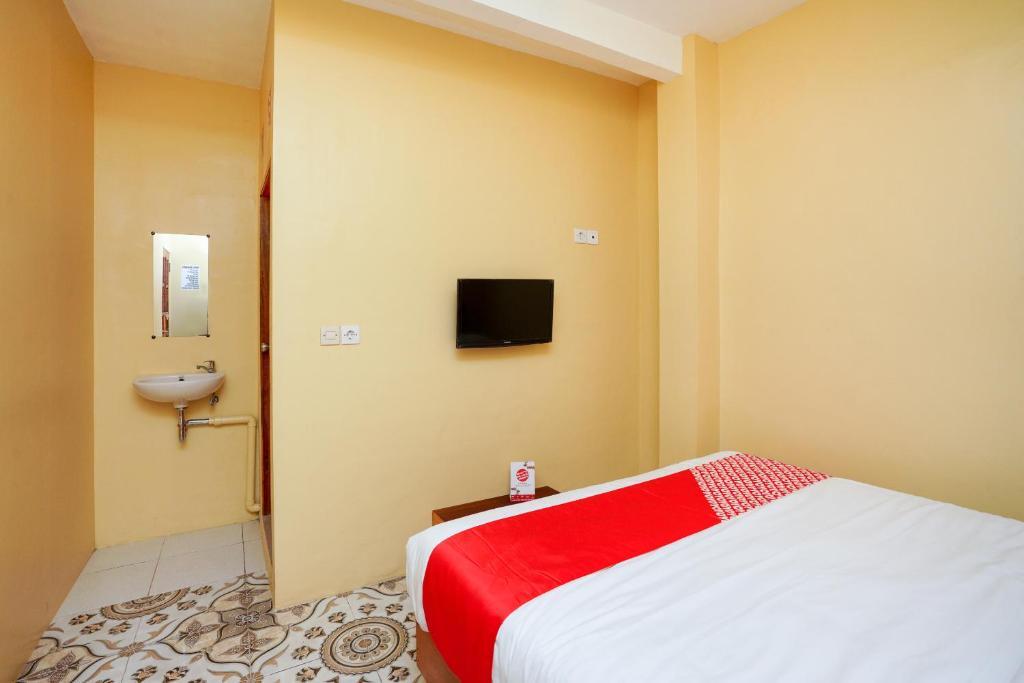 Сурабая: OYO 2656 Az Zahra Residence Syariah