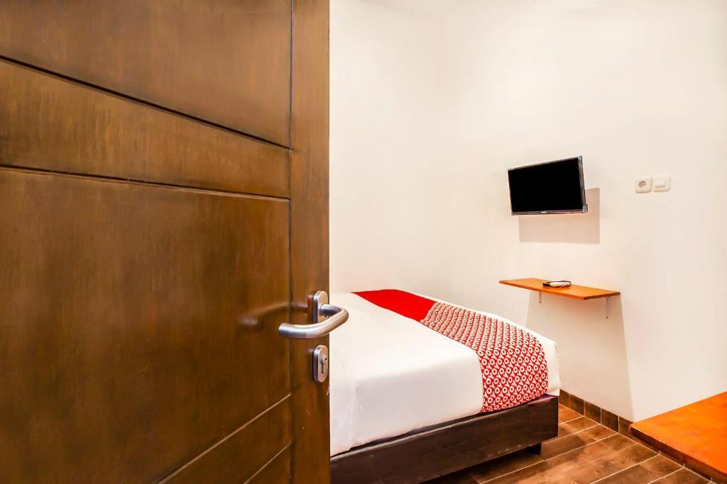 Медан: OYO 2720 Sutomo Inn