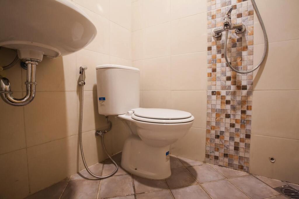 Медан: OYO 2720 Sutomo Inn
