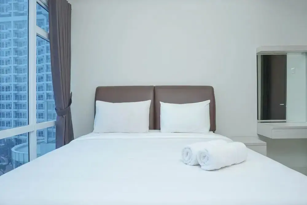 Джакарта: Simple and Minimalist 3BR Apartment at Puri Mansion