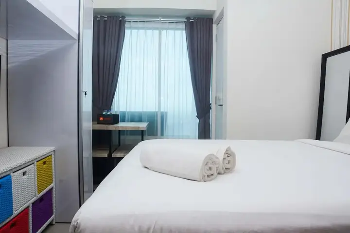 Бекаси: Minimalist and Posh 1BR Grand Kamala Lagoon Apartment By Travelio