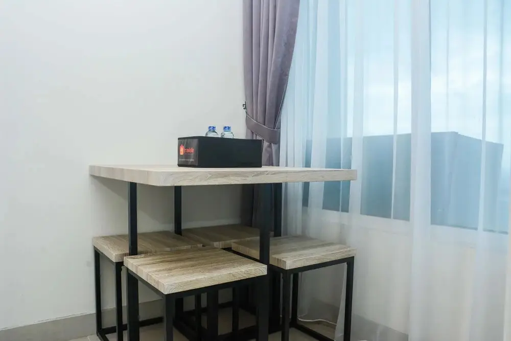 Бекаси: Minimalist and Posh 1BR Grand Kamala Lagoon Apartment By Travelio