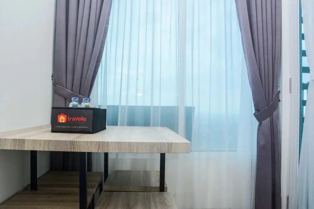Бекаси: Minimalist and Posh 1BR Grand Kamala Lagoon Apartment By Travelio