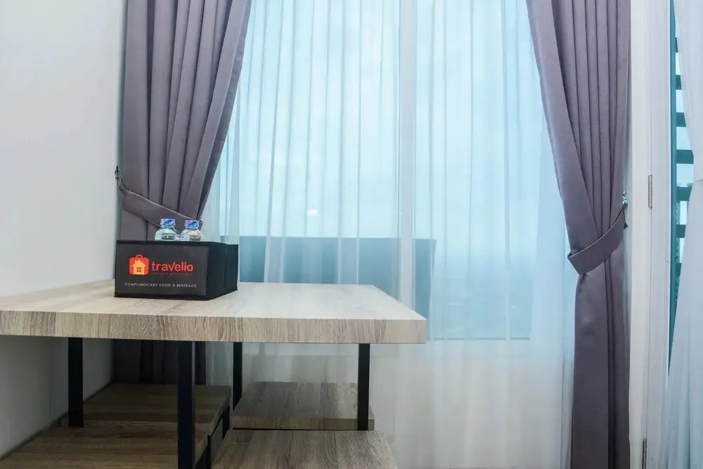 Бекаси: Minimalist and Posh 1BR Grand Kamala Lagoon Apartment By Travelio