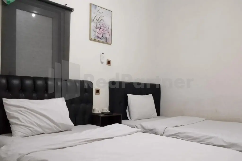 Сиамис: OYO 2975 House Of Mahira Syariah