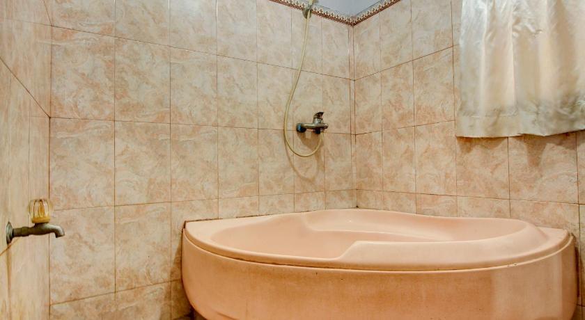 Палембанг: OYO 3180 Hotel Rian Cottage