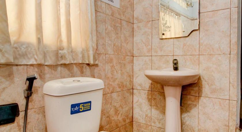 Палембанг: OYO 3180 Hotel Rian Cottage