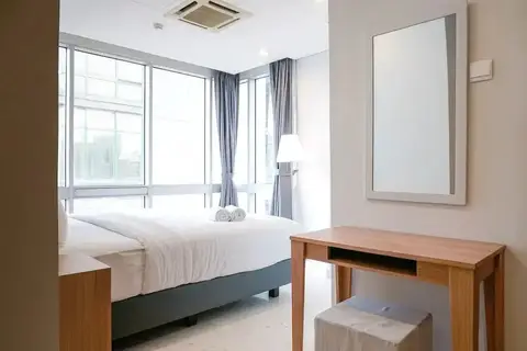 Comfortable Deluxe 2BR at The Empyreal Condominium Epicentrum Apartment By Travelio — фото 1