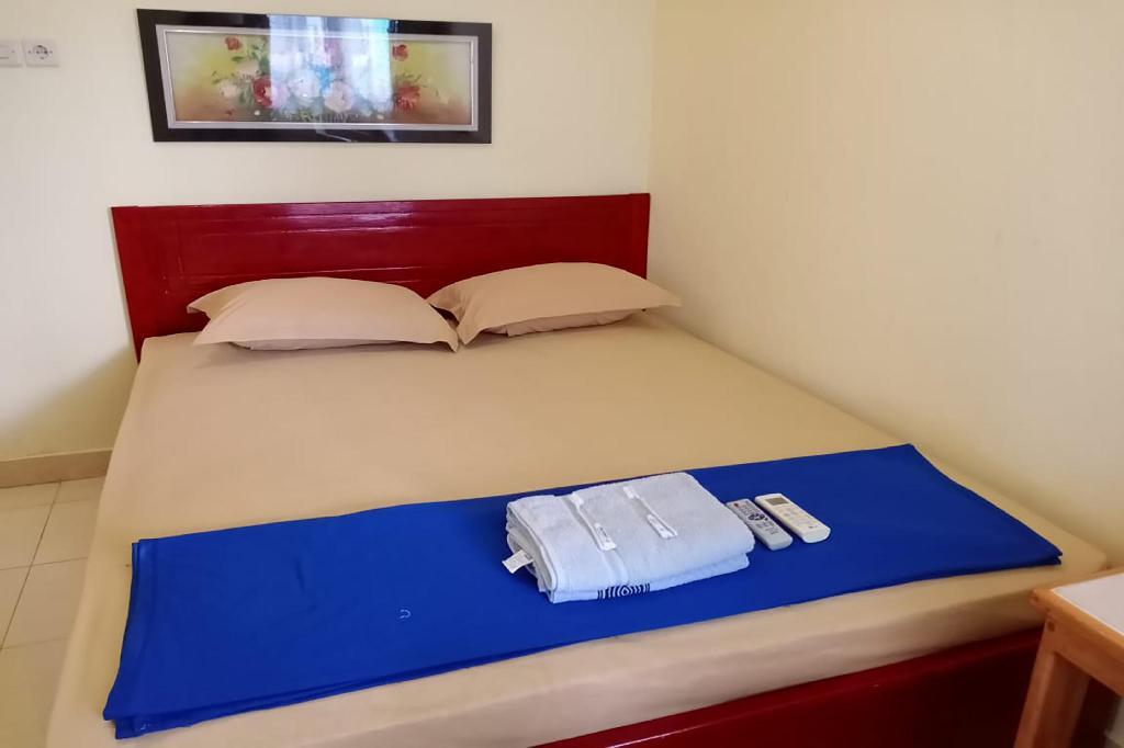 Палу: OYO 3348 Minimalis Homestay