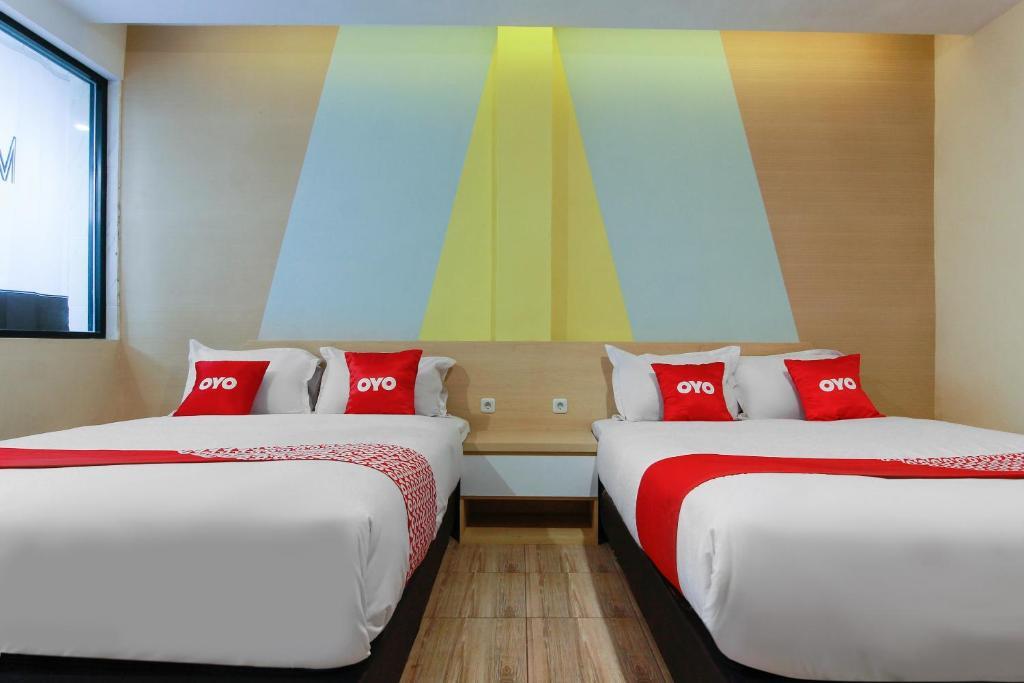 Медан: Capital O 3476 Millenium Inn