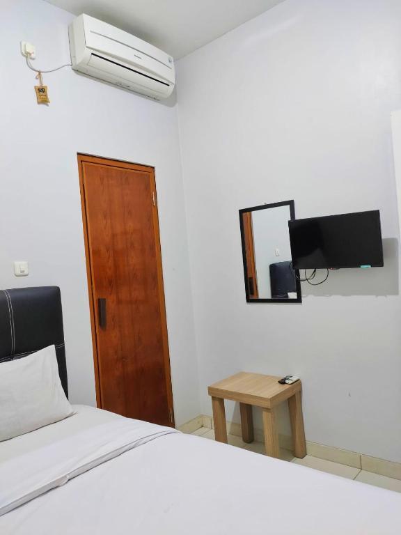 Чиребон: OYO 936 Tremigo Guest House Syariah