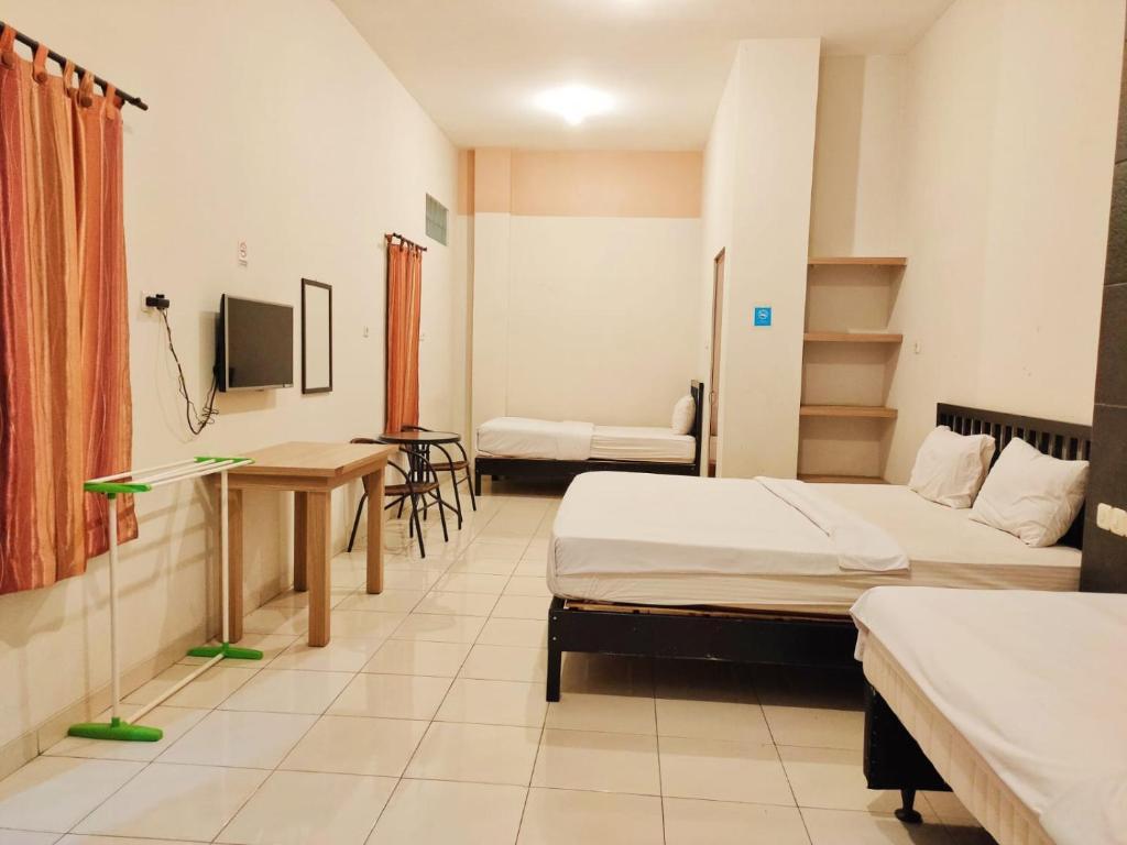 Чиребон: OYO 936 Tremigo Guest House Syariah