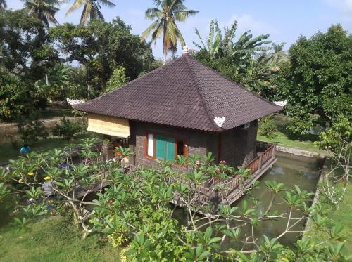 Селемадег: Natural 1 Bedroom lodge - Balian Beach