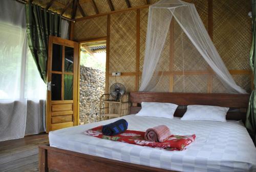 Паданг: Ricky's Beach House