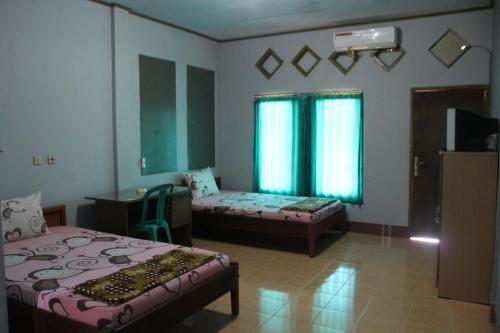 Прайя: Hotel Penginapan Artha Praya