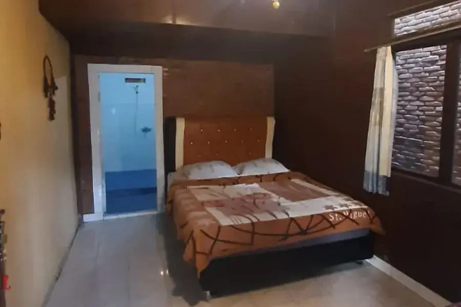 Озеро Тоба: Laster Jony's Guesthouse Samosir RedPartner