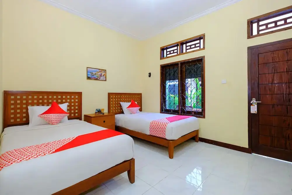 Мангсит: Mangsit Garden Homestay by OYO Rooms