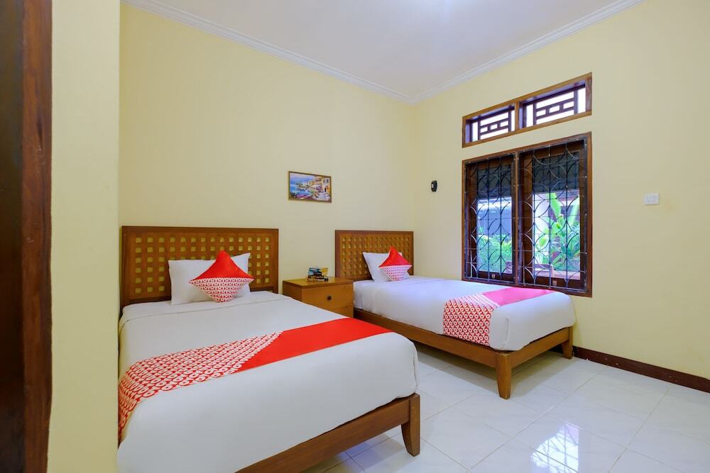 Мангсит: Mangsit Garden Homestay by OYO Rooms