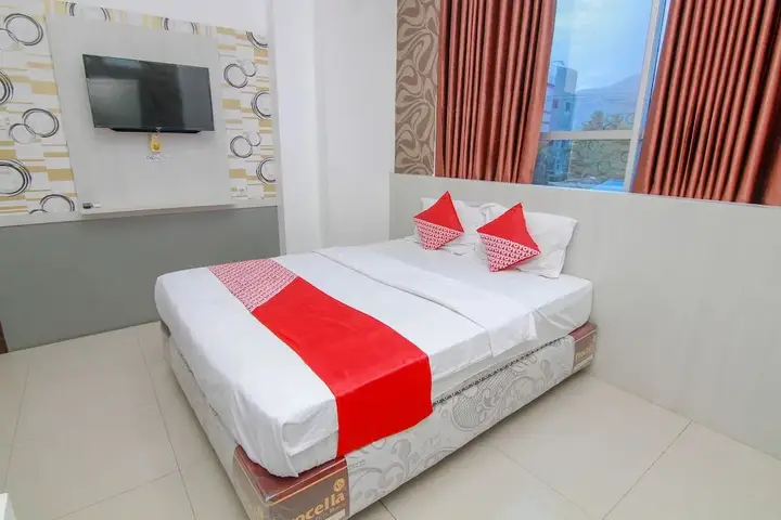 Палу: R Four Hotel by OYO Rooms
