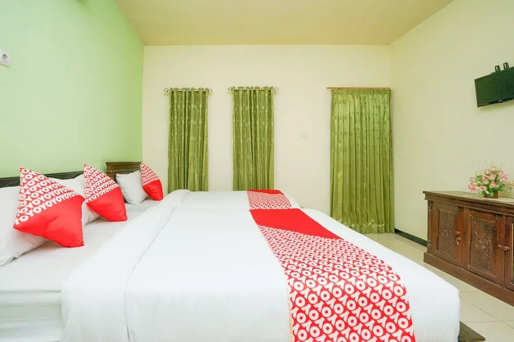 Проболинго: Penginapan Anggrek Syariah 1 by OYO Rooms