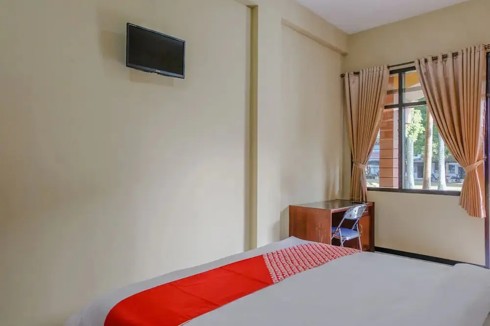 Маланг: Uniga Malang Family Residence by OYO Rooms