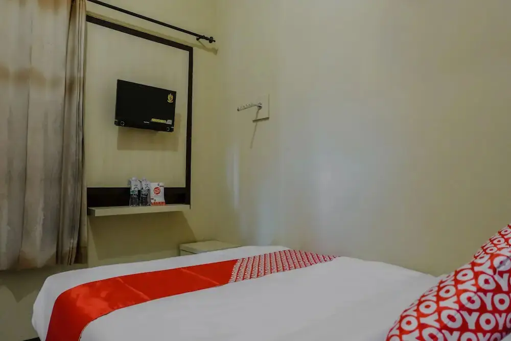 Маланг: Uniga Malang Family Residence by OYO Rooms