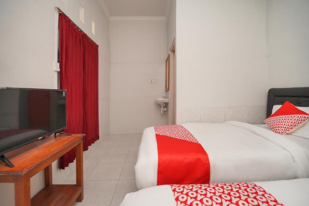 Проболинго: OYO 2937 Nindy Residence 2