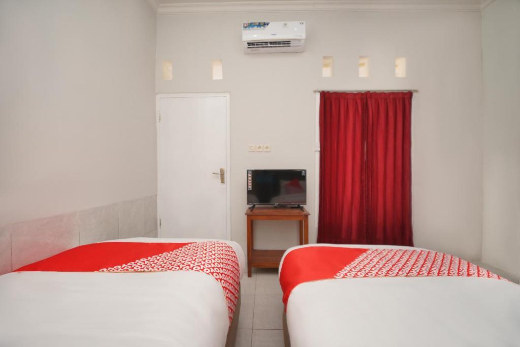 Проболинго: OYO 2937 Nindy Residence 2
