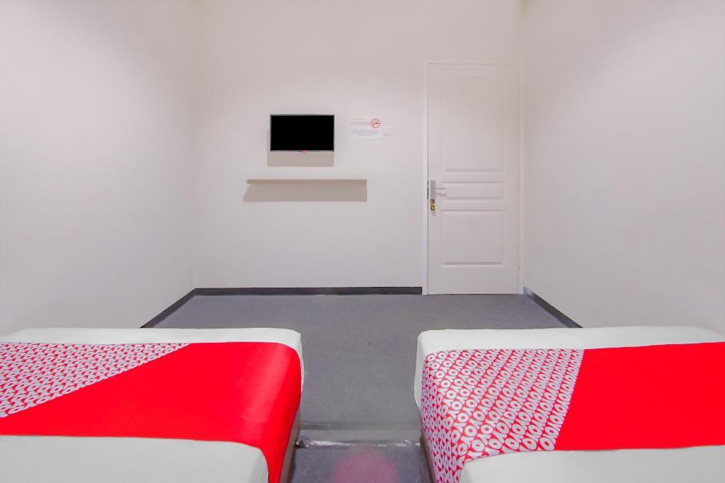 Маланг: OYO 4004 Vivo Rooms