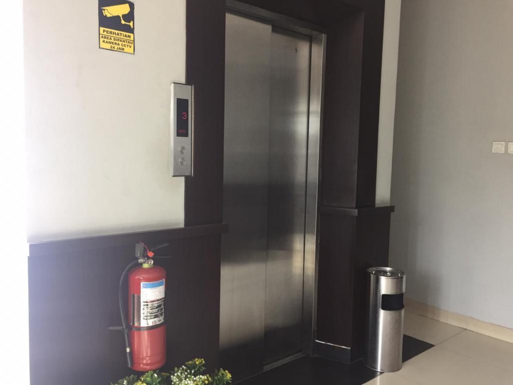 Джакарта: SUPER OYO Capital O 90056 Wisma Kebon Kacang 9