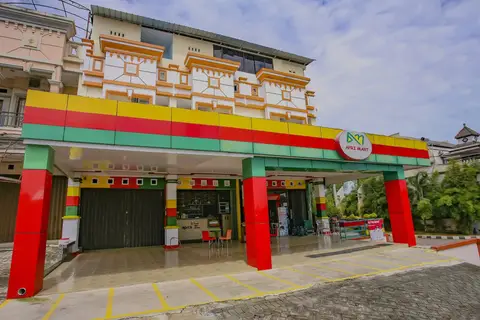 Super OYO 90072 Apri Inn Syariah — фото 1